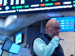 traders work on the floor at the new york stock exchange in new york tuesday march 10 2026 2