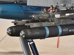 tucson az usa march 25 2023 a pair of agm 114 hellfire missiles mounted on an mq 9 reaper drone