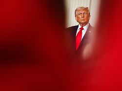 u s president donald trump listens as first lady melania trump not pictured speaks during a womens history month event in the east room of the white house on march 12 2026 in washington d c