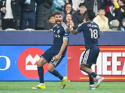 vancouver whitecaps thomas muller left and edier ocampo celebrate muller s second goal against toronto fc during the first half of an mls soccer match in vancouver on saturday feb 28 2026