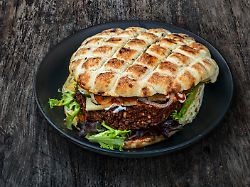 veggie burger in pita bread with a bean patty