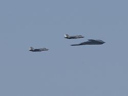 washington d c united states july 4 a b 2 spirit stealth bomber escorted by two f 22 fighter jets of the u s air force flies over washington d c during independence day celebrations on july 4 2025