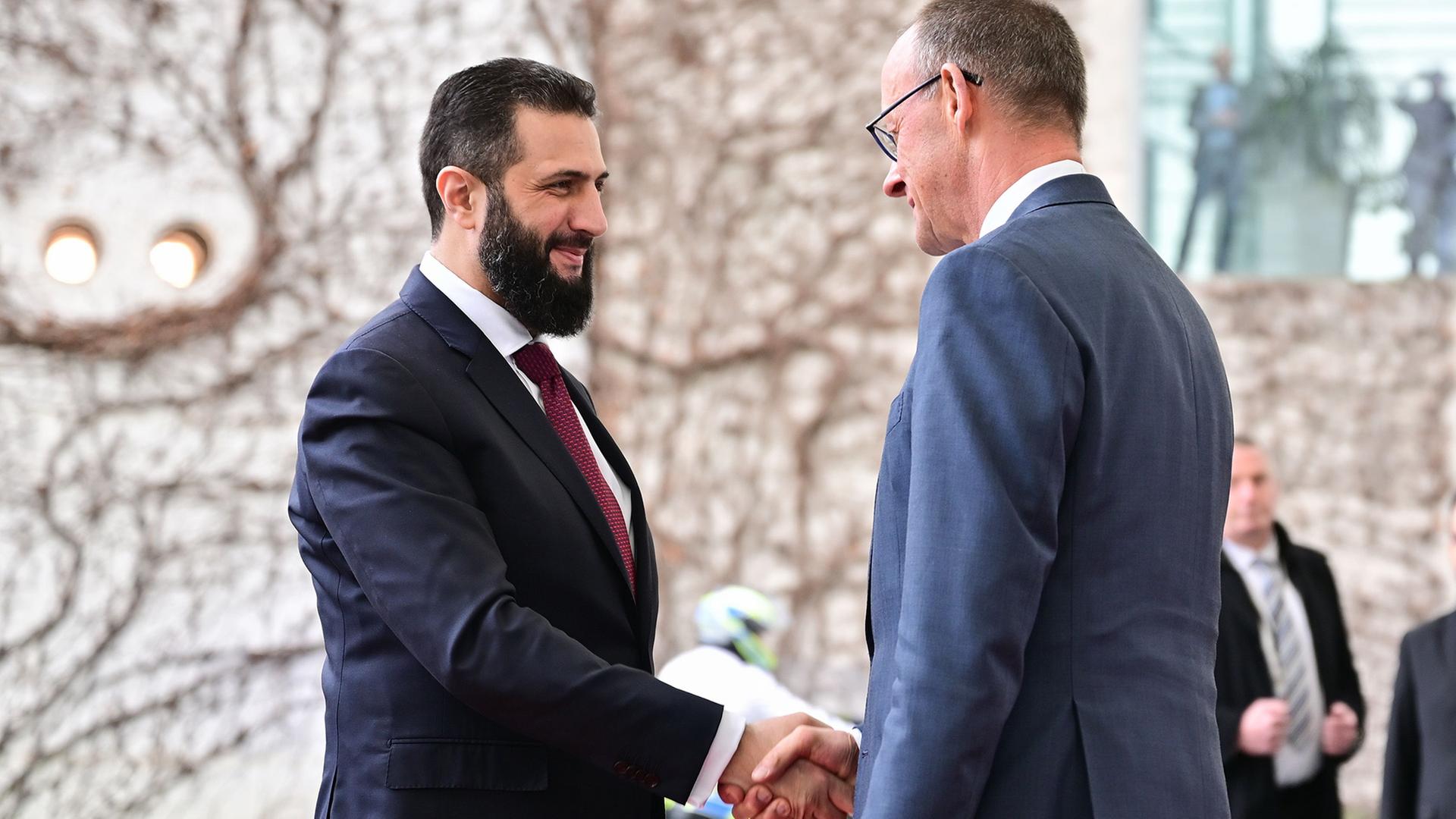 friedrich merz ahmed al sharaa 102