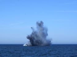 a blast is seen during disposal of an unexploded mine at the international naval mine clearance operation open spirit eodex 2025 at sea near klaipeda lithuania may 20 2025