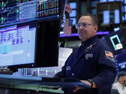 a trader works on the floor at the new york stock exchange nyse in new york city u s april 16 2026