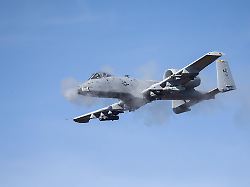 an a10 warthog shoots from its gau 8 a avenger 30mm gun