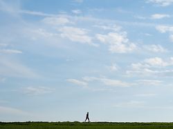 april 16 2026 frankfurt hesse germany a woman walks through a park in frankfurt germany