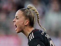bayern s giulia gwinn celebrates her side s third goal during a german women s bundesliga soccer match between 1 fc union berlin and bayern munich in berlin germany wednesday april 22 2026