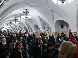 commuters walk inside taganskaya metro station in moscow on march 6 2026