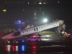 emergency crews work around an air canada express jet that had collided with a ground vehicle at new york s la guardia airport in queens new york u s march 23 2026