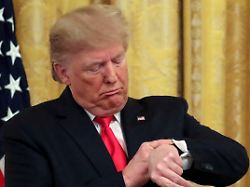 file photo u s president donald trump checks his watch during an event to celebrate federal judicial confirmations in the east room of the white house in washington d c u s november 6 2019