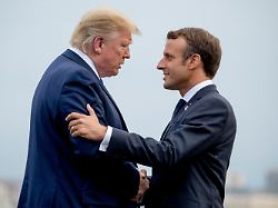 file president donald trump and french president emmanuel macron greet each other at the g 7 summit before a dinner at the lighthouse of biarritz france aug 24 2019