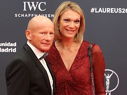 former alpine skiing star maria hoefl riesch ger with partner johann schrempf at the red carpet of the laureus world sports award 2026 madrid palacio de cibeles 20 04