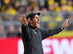 freiburg s head coach julian schuster reacts during the german bundesliga soccer match between borussia dortmund and sc freiburg in dortmund germany sunday april 26 2026