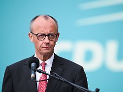 german chancellor friedrich merz looks on during a press statement during the cdu csu parliamentary group s executive committee meeting in berlin germany april 27 2026
