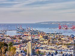 haifa israel march 11 2023 sea port in the city of haifa panorama of the port and city buildings against blue sky with clouds