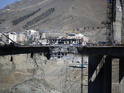 karaj iran april 03 significant sections of the b1 bridge are seen destroyed after an airstrike attributed to the united states and israel targeted the site near tehran in karaj iran on april 03 2026