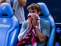 munich germany april 18 flavio cobolli ita in tears after the bmw open by bitpanda singles match between alexander zverev ger vs flavio cobolli ita at mttc iphitos on april 18 2026 in munich germany