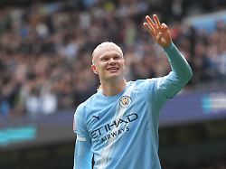 manchester city s erling haaland celebrates after scoring his third goal during the fa cup quarter final soccer match between manchester city and liverpool in manchester england saturday april 4 2026