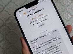 march 11 2026 ho chi minh city ho chi minh city vietnam a mobile phone displays a phishing message used in attempts attributed to russia linked hackers to compromise accounts on signal