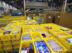 october 12 2022 ruskin florida usa staff at tpa1 amazon fulfillment center pack one of 60 pallets of snack foods to be donated for hurricane ian disaster relief on wednesday oct 12 2022 in ruskin