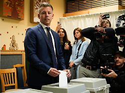 opposition candidate peter magyar places his ballot in budapest hungary on 12 april 2026