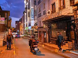 people walk past the harbour suites old city hotel in istanbul turkey monday nov 24 2025