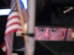 people work on the floor at the new york stock exchange in new york monday april 13 2026