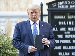 president donald trump holds a bible in front of st john s episcopal church june 1 2020 his daughter presidential advisor ivanka trump handed him the book used as a prop the photo opp