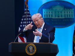 president donald trump pretends to aim a sniper gun while speaking with reporters in the james brady press briefing room at the white house monday april 6 2026 in washington