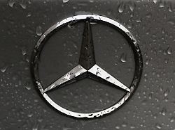 raindrops are seen on the logo of mercedes benz car in krakow poland on october 5 2016
