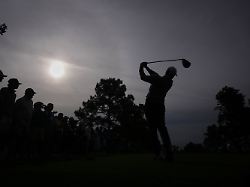 rory mcilroy of northern ireland watches his tee shot on the ninth hole during a practice round ahead of the masters golf tournament at the augusta national golf club tuesday april 7 2026 in augusta ga