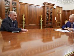 russian president vladimir putin right listens to nornikel metallurgical company ceo vladimir potanin during their meeting at the kremlin in moscow russia tuesday oct 14 2025