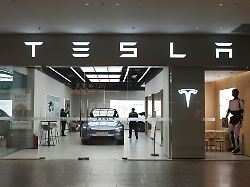shanghai china march 22 2026 a tesla new energy vehicle sales store in shanghai china on march 22 2026
