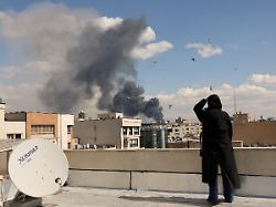 smoke rises following an explosion after israel and the u s launched strikes on iran in tehran iran march 1 2026