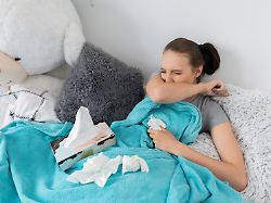 strong cough on the elbow by a very cold young teenager who is lying in her bed