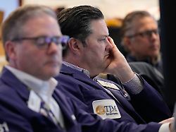 terrance mccauley works on the floor at the new york stock exchange in new york tuesday april 7 2026