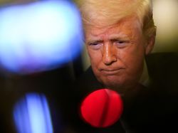 u s president donald trump looks on as he speaks to members of the media aboard air force one en route to joint base andrews maryland u s march 29 2026 1