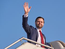 vice president jd vance waves while boarding air force two as he leaves islamabad sunday april 12 2026 after attending talks on iran