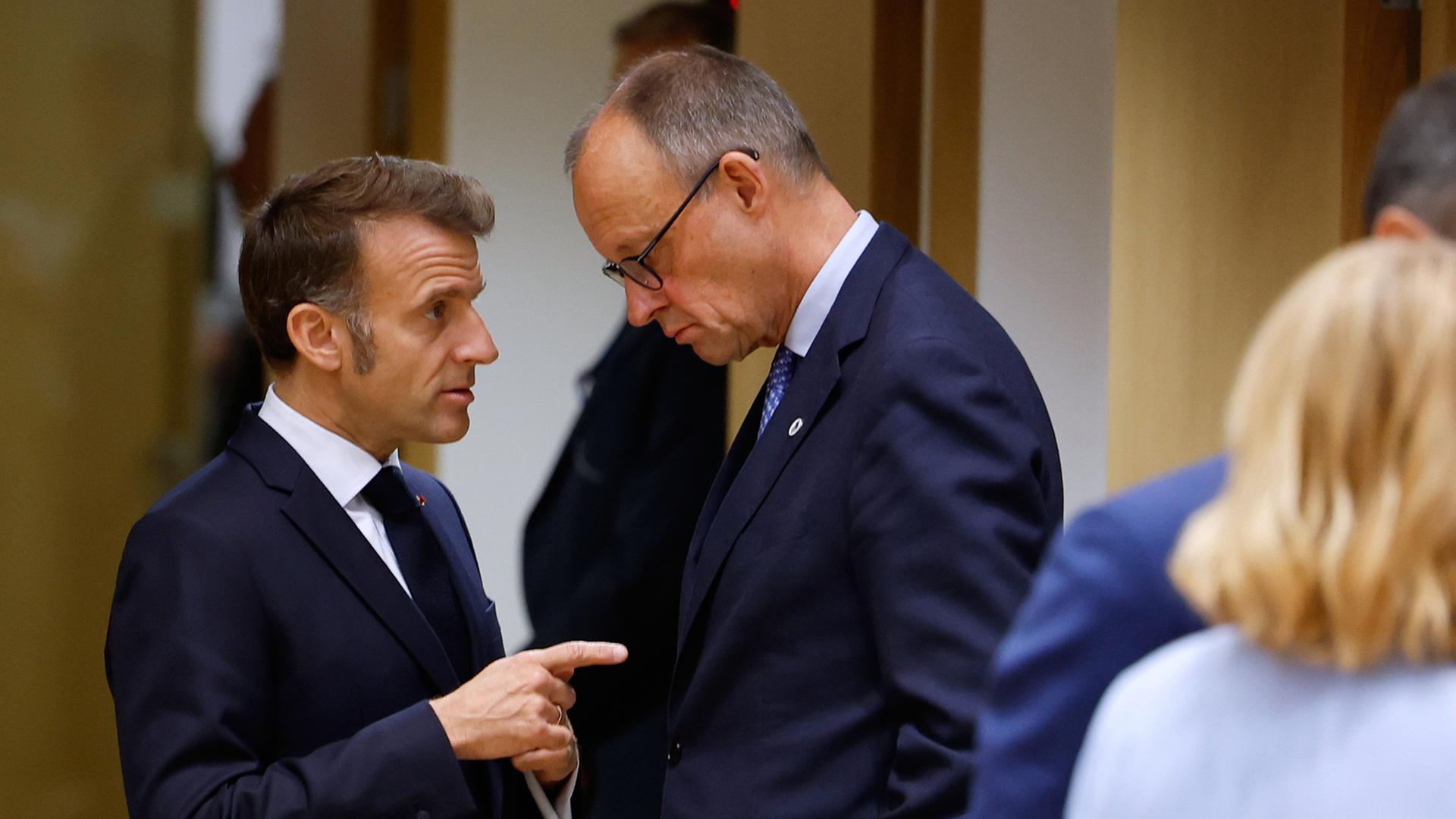emmanuel macron friedrich merz 102
