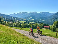 two senior girlfriends having fun during a cycling tour in the allgau alps near oberstaufen bavaria germany modellfreigabe vorhanden