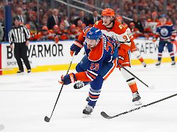 anaheim ducks leo carlsson 91 pursues edmonton oilers leon draisaitl 29 during the second period of an nhl playoff game in edmonton on monday april 20 2026