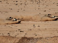 battle tanks drive in formation during the african lion joint military exercise between us and moroccan forces in the tan tan region in southwestern morocco on may 8 2026
