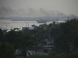 black smoke rises in the direction of a port in bandar abbas southern iran on may 5 2026 the standoff between the united states and iran continues over the strait of hormuz off the iranian port city 2
