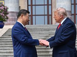 chinese president xi jinping left shakes hands with u s president donald trump at the great hall of the people in beijing thursday may 14 2026