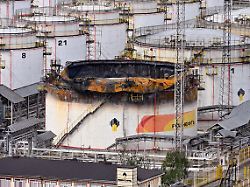 genre photography the burned oil storage facility