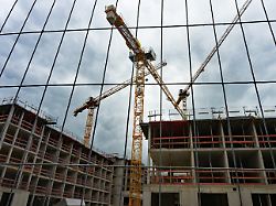 in dem neubaugebiet freiham entsteht auf 350 hektar ein neuer stadtteil in dem ueber 25 000 menschen leben und fast 15 000 arbeiten werden
