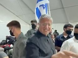 israeli national security minister itamar ben gvir reacts as flotilla activists are detained by israeli forces in ashdod port israel in this screen grab taken from a video released on may 20 2026