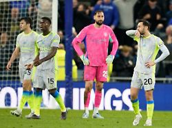 manchester city players stand dejected during the premier league soccer match between manchester city and everton in liverpool england monday may 4 2026 1