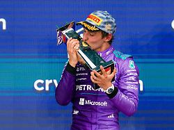 mercedes driver kimi antonelli of italy kisses his trophy after winning the miami formula one grand prix auto race sunday may 3 2026 in miami gardens fla